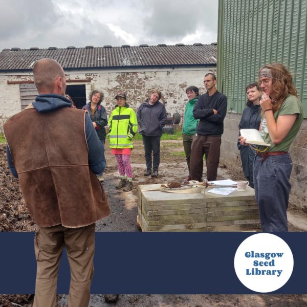 A group of people with light and medium light skin tone stand in a circle at a worksite. Logo: Glasgow Seed Library A group of people with light and medium light skin tone stand in a circle at a worksite. Logo: Glasgow Seed Library